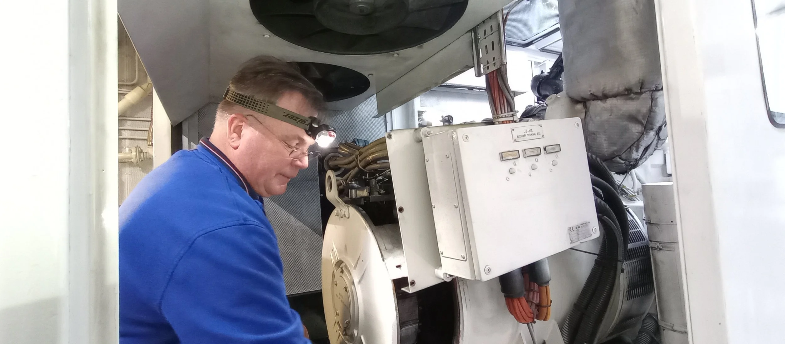Chris servicing a marine engine