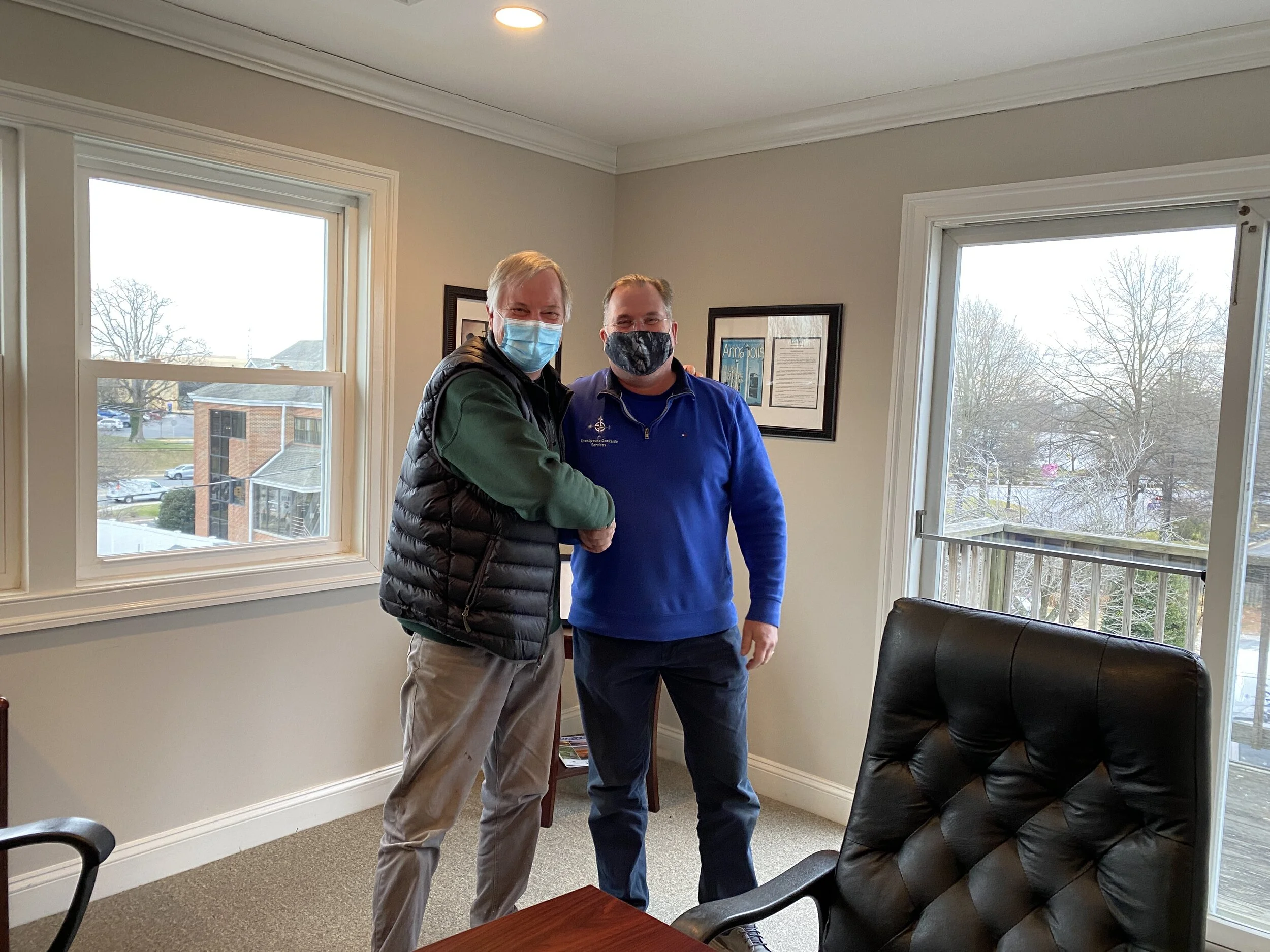 Shaking hands with a happy client