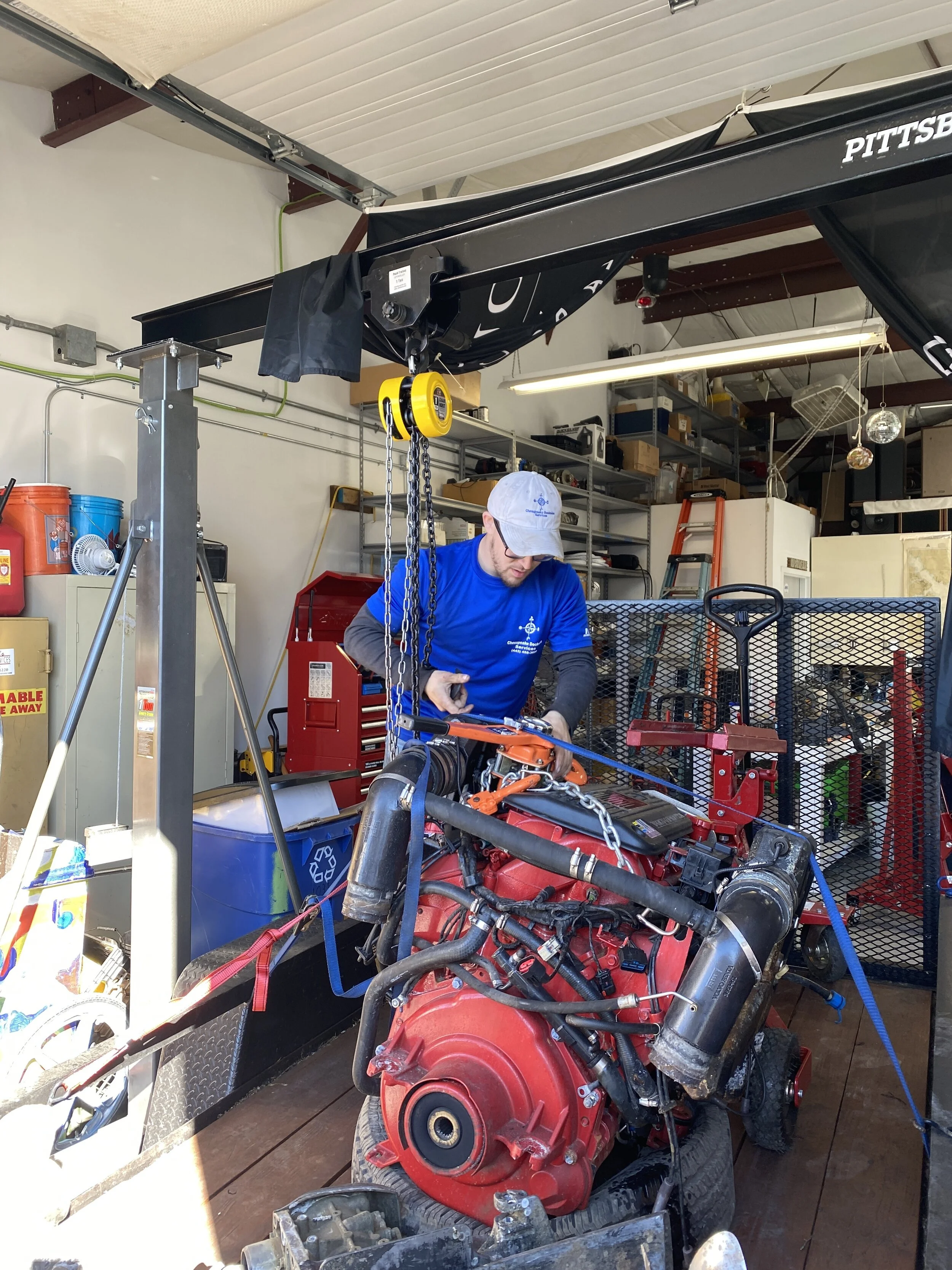 Technician working on a marine engine