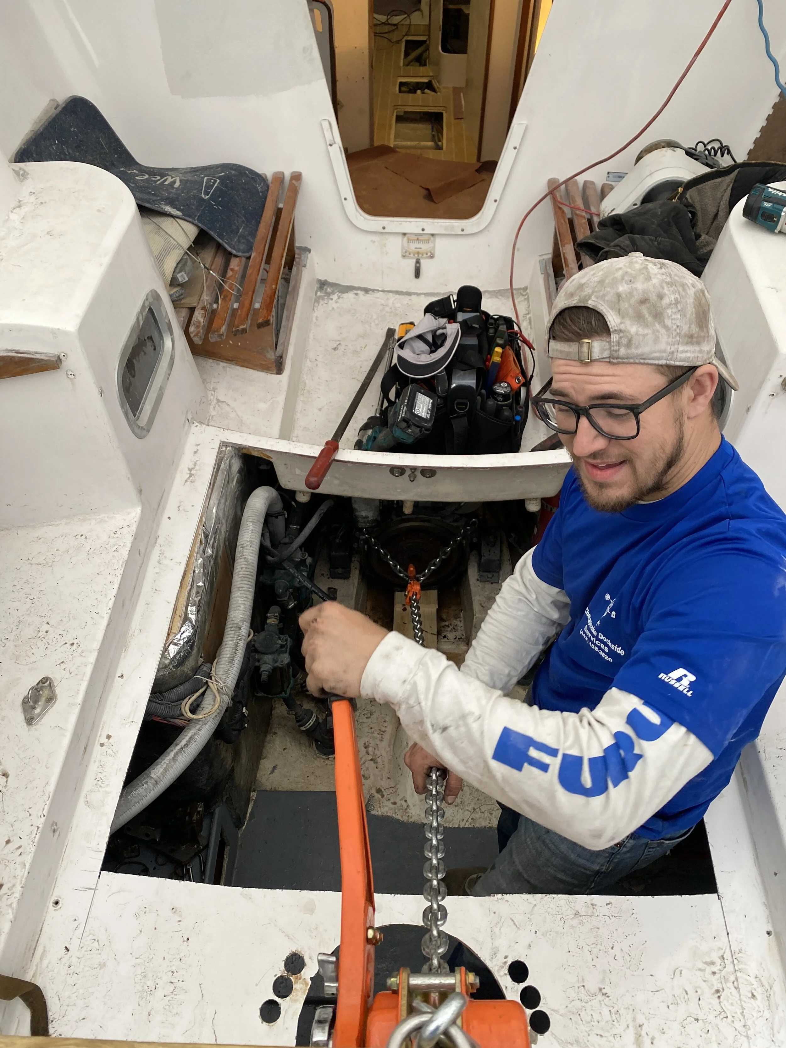 Technician servicing engine components