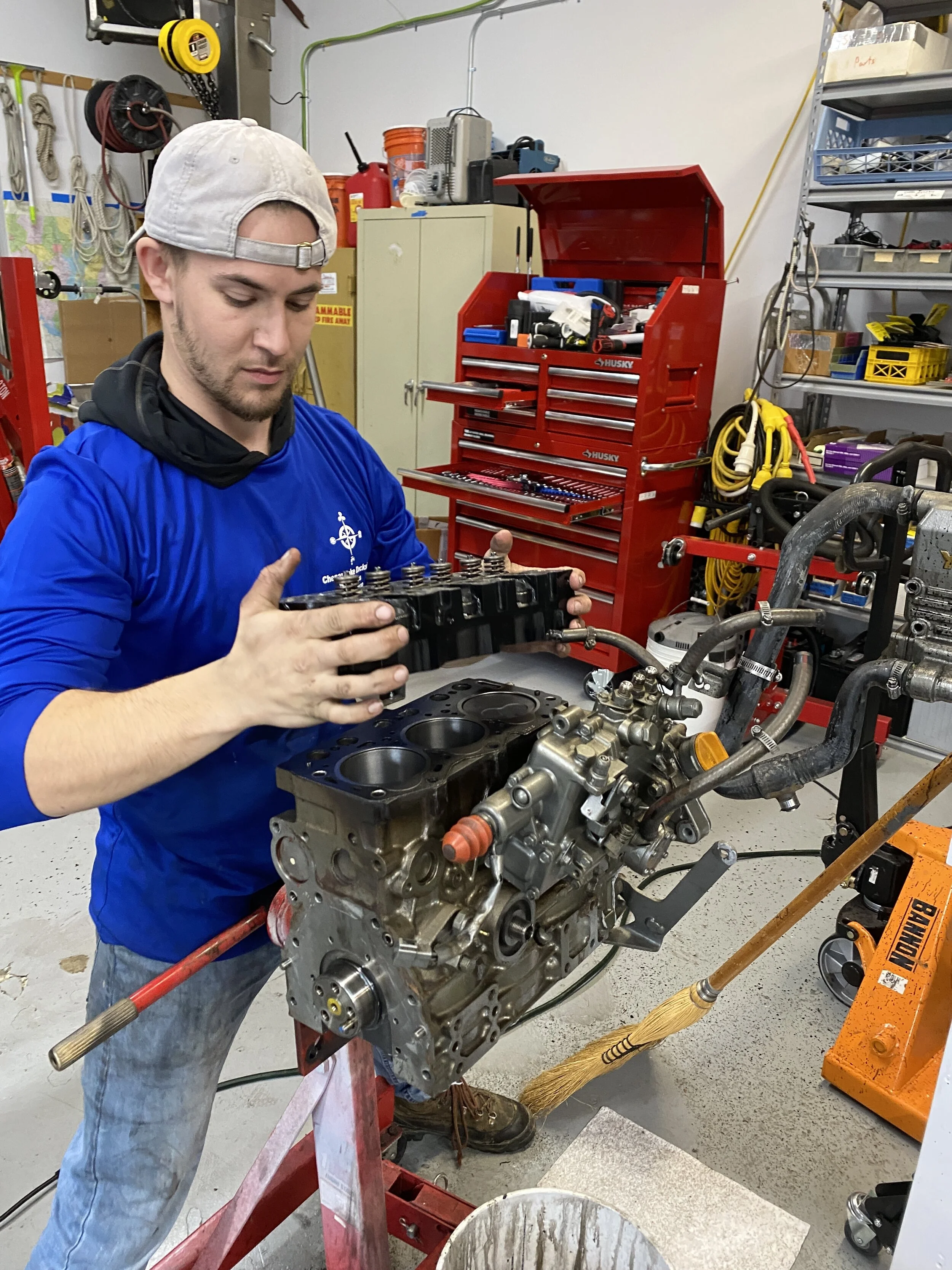 Technician servicing a marine engine
